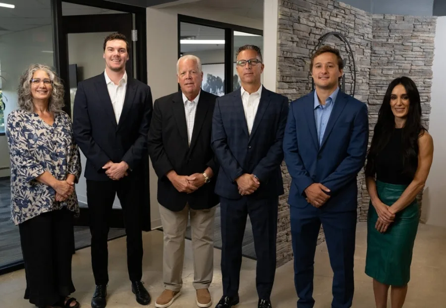 The leadership team at Maverick Partners Independent Wealth Management, poses in the reception of their offices in Marlton, New Jersey