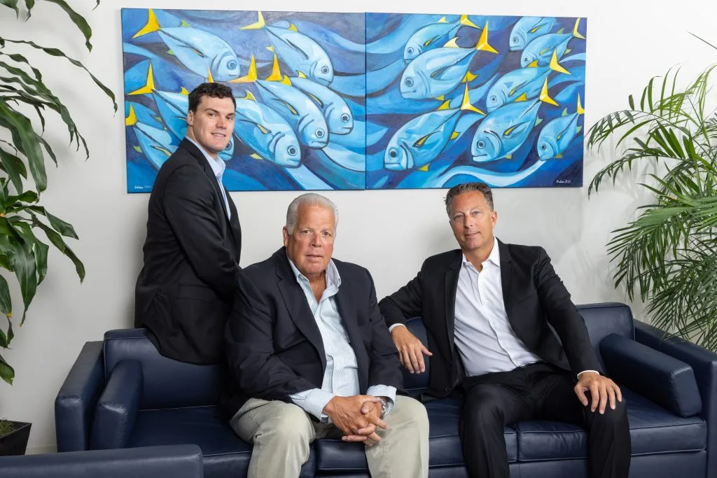 Chayse Primeau, John Gallagher and Mark Levin of Maverick Partners Wealth Management, pose in their offices in New Jersey