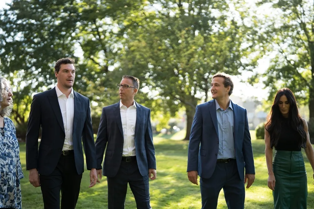 The leadership team of Maverick Partners Wealth Management takes a break from work in a park near their offices in Marlton, NJ